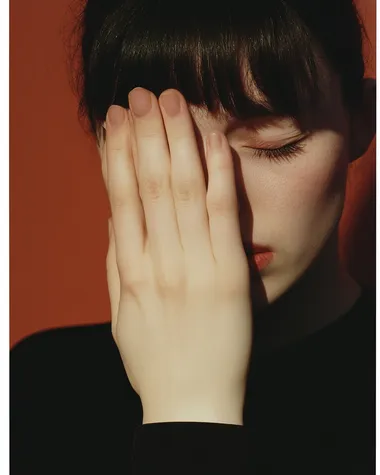 An epic minimal photography, young woman feeling upset, by [Jonpaul Douglass, Ren Hang, Jamie Hawkesworth, William Eggleston, Ren Hang, Defina Carmona], close-up photography, hard expression, award winning photography, kodak portra 400,   dfbshvr