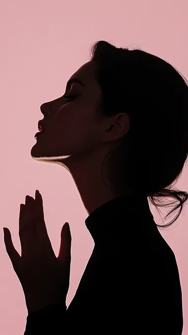 Female model's profile, shadow, contrast, light pink background, black shadow, black profile shadow, black, unclear facial features, backlight, beautiful hand posture, different gestures, advertisement, blockbuster, high-end, photography, ultra high definition
