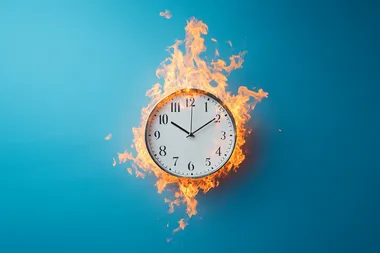 clock with timer burns with fire, blue background,