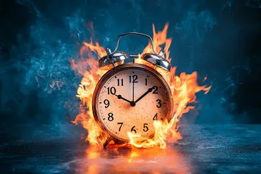 clock with timer burns with fire, blue background,