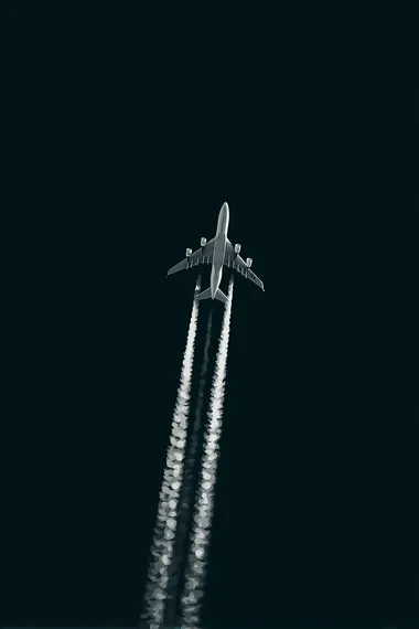 An airplane flying in the sky, leaving trails behind it, against a black background, in the style of white on dark grey.