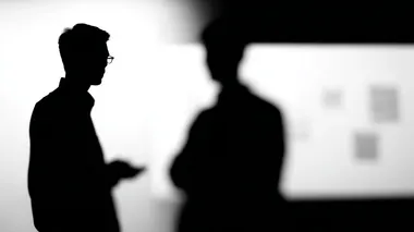 two colleagues discussing while standing next to a whiteboard filled with diagrams, modern industrial office, daylight, candid scene, realistic setting, photorealistic, 35mm (wide angle) lens, low view, medium shot  rofile tiafjg9