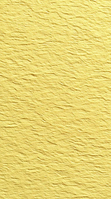 PASTEL yellow paper texture for background.