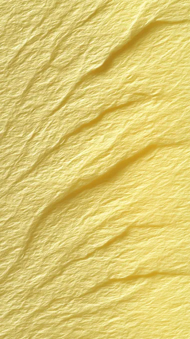 PASTEL yellow paper texture for background.