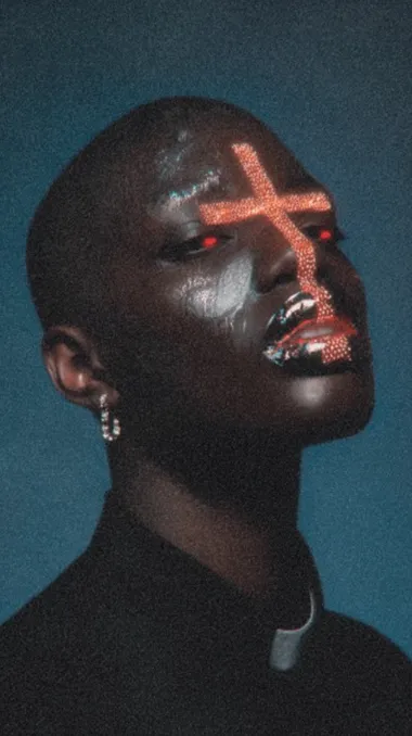 A futuristic, high-contrast portrait of a person with jet-black, ultra-glossy skin, set against a bold, vibrant blue background. The face is dramatically stylized with a glowing neon-orange cross painted or projected over the forehead, nose, and mouth, creating a striking, symmetrical design. The lips are reflective, metallic black with partial orange accents. The eyes glow intensely red, adding a surreal and intimidating effect. Lighting is studio-clean and hyper-saturated, emphasizing surface reflections and texture. The overall style is cyber-gothic, avant-garde, and extremely sharp, with no grain, no blur, and extreme color contrast   rofile 8b747ss yidgi4z