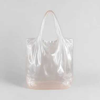 side shot of tote bag made of inflatable balloon material, flating in a white clean background. --exp 15