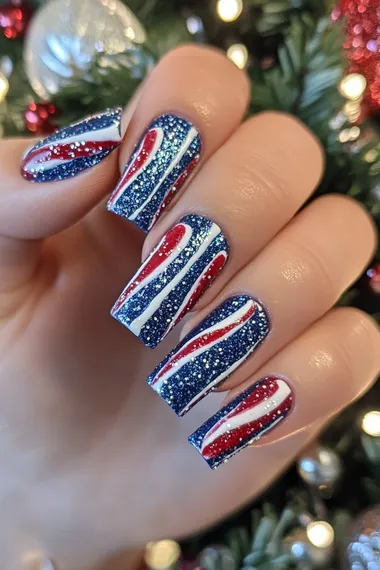A photo of a woman's hand with long coffin nails with sparkly textured glitter of blue and white candy cane stripes