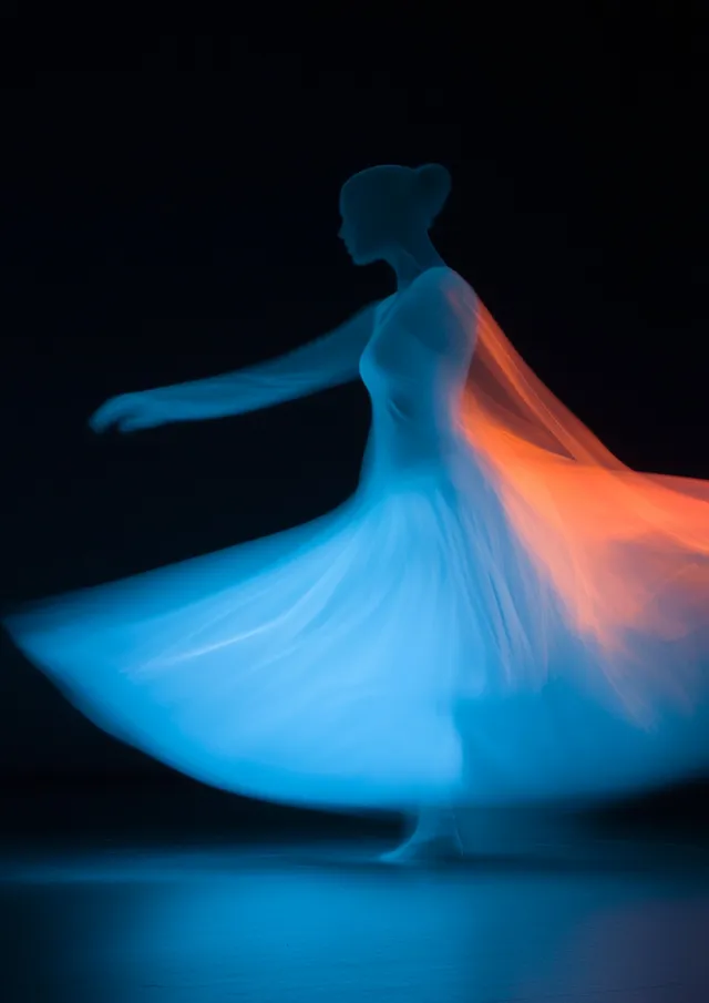 Dancer in White Dress Moving Gracefully in Urban Strobe Lighting