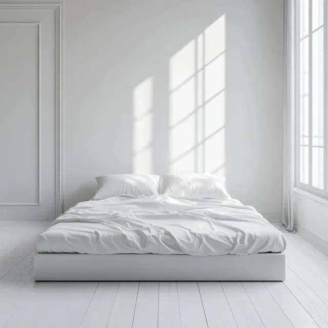 White bedroom with minimalist decor, bed, white mattress, and window