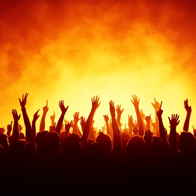 Festival crowd with hands raised, vibrant LED stage visuals, ad space
