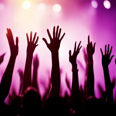 Festival crowd with hands in the air, stunning LED stage visuals, room for advertising content   773tzfv
