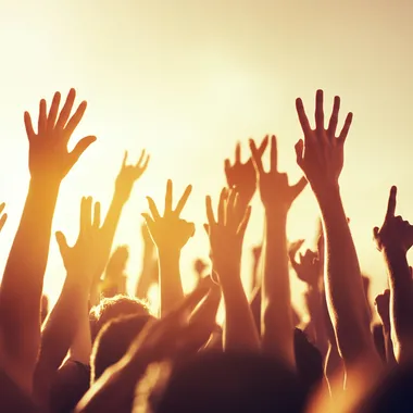 Festival crowd with hands in the air, stunning LED stage visuals, room for advertising content   773tzfv