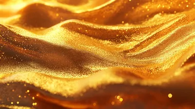 Create a realistic image of a vibrant golden texture resembling a glittering surface, with a rich, warm yellow color scheme. The image should convey a sense of warmth and richness, showcasing the shine and sparkle typical of a gold material.
