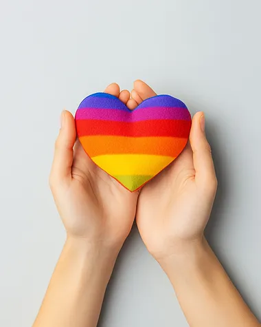 Hands Holding Rainbow Hearts, a professional studio shot of hands delicately presenting a vibrant rainbow heart, fingers elegantly positioned, minimalist soft-focus background,   ludog5a --s 250