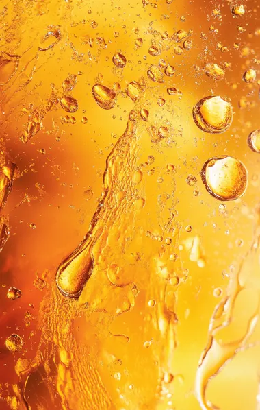 Amber-yellow abstract textured background, orange water droplets, modern art print for wall poster.