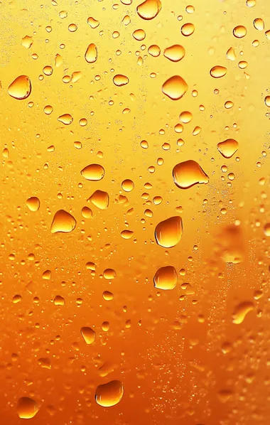 Amber-yellow abstract textured background, orange water droplets, modern art print for wall poster.