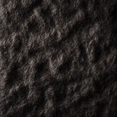 A seamless, ultra hd dark wool felt texture, flat top-view, with soft and diffuse shadows, subtle highlights from global illumination, showcasing the softness and natural grain of the fibers. Created Using: ultra-high-resolution texture capture, photorealistic wool simulation, advanced lighting techniques, soft focus on shadows, tonal gradients