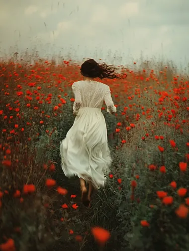 Retro movie style film photography,Slow shutter photography motion blur,A woman in a white dress ran through a field of red flowers,