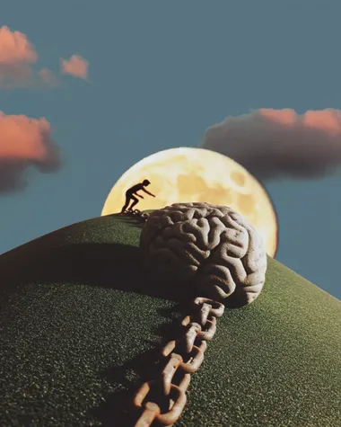 A lone person climbing a soft green hill beneath a dreamy twilight sky, oversized full moon glowing above. Their feet are bound by a massive, hyper-detailed human brain, sculpted like stone, dragging behind them on a chain. The figure is straining forward, mid-step, clearly trying to ascend but being held back. The hill curves gently, evoking both beauty and struggle. Stylized minimal clouds drift in the sky, surreal and fluffy. Muted cinematic color palette--cool blues, soft greens, pale pink moonlight, subtle shadows. Composition is balanced and clean, almost like a dream still--evoking emotion and curiosity at a glance. High realism with a painterly finish.     rofile zrho2ia