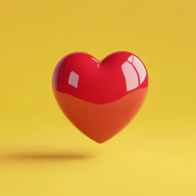 a red heart shaped object on a yellow background