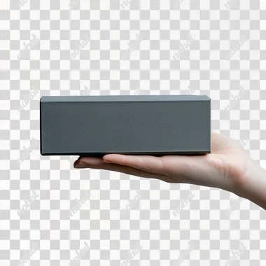 Actual image of a hand holding a rectangular gray box, artistic photography style to present the box itself, light background, side box view