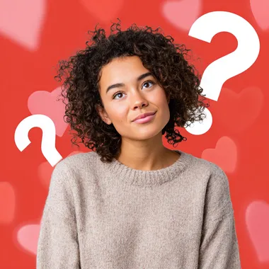 woman, hearts in the background, and a big question symbol