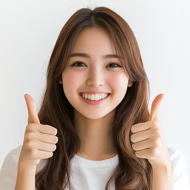 Japanese girl in her 20s with 2 thumbs up, smiling, against white background