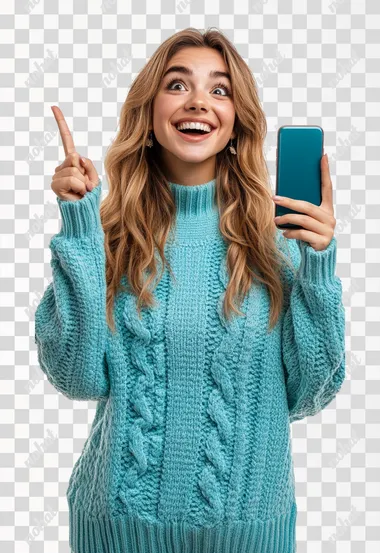 25 year old woman in a turquoise christmas sweater happy and pointing up with a phone in hand, looking at camera, isolated over a white background