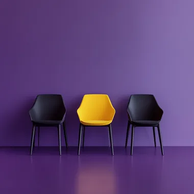 A hyper-realistic, high-resolution photograph of five chairs neatly aligned side by side in a modern interior setting. Four of the chairs are dark-colored (black or deep plum), and the center chair is bright yellow, placed precisely in the middle to draw focus. The scene is set against a smooth matte purple wall and a matching purple floor, creating a soft monochromatic atmosphere. The lighting is natural softbox-style, coming slightly from the side and above, subtly highlighting the texture and color of the yellow chair to make it stand out. Include soft shadows, reflections on the floor, and slight depth of field (bokeh effect) to mimic a shot taken with a DSLR camera using a 50mm f/1.8 lens. The overall image should feel sharp, clean, and cinematic, with balanced contrast and realistic material textures like fabric and plastic or metal on the chairs.