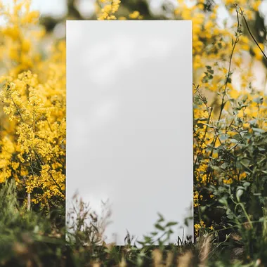 sophisticated, elegant, simple. large blank white wedding welcome sign mockup A1. straight on. realistic. outdoors, yellow flowers