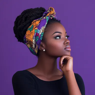 overly pensive african woman on purple background