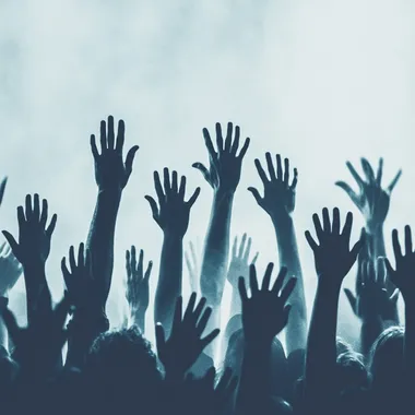 Festival crowd with hands in the air, stunning LED stage visuals, room for advertising content   773tzfv