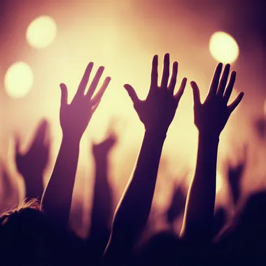 Festival crowd with hands in the air, stunning LED stage visuals, room for advertising content   773tzfv