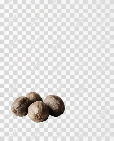 editorial photo of small pile of 5-6 Nutmegs on white background
